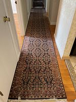 Full-length view of runner installed in hallway