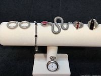 Group shot of all six items on display stand