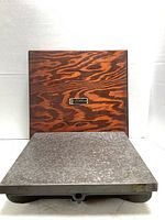 Surface plate and wooden cover side by side