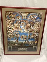 Full view of framed print showing red wood frame, beige mat, detailed reproduction of The Last Judgment with multi-figure composition and blue sky background.