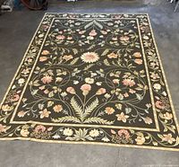 Full top-down view of entire rug showing overall floral pattern and border