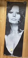 Full length life size black and white Sophia Loren close-up poster with pearl necklace and black dress.