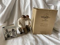 Photo showing the Willow Tree Father and Son figurine, the mini book Fathers and Sons, and the original box.