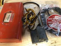 Red metal propane torch kit and polisher with connected cable, new Snap-On wire protector in packaging