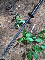 Close-up of ground screw base for the garden pole