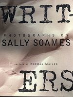 Close-up photo of the book cover titled 'Writers' Photographs by Sally Soames' with preface by Norman Mailer.