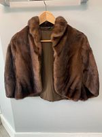 Front view showing exterior mink fur and interior lining