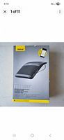 Front of retail box showing Jabra Freeway wireless in car Bluetooth hands free speaker with device image and branding
