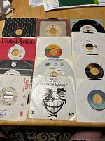 First overview showing 12 of the 21 records in assorted company sleeves