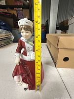 Front view with tape measure showing height