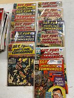 Group of bagged issues laid out in two columns plus two front issues