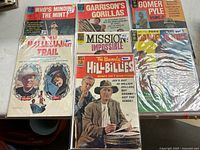 Group shot of seven Dell comics