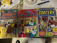 Three comic books: Archie's Pals 'n' Gals, Archie's Joke Book Magazine, Chilling Adventures in Sorcery
