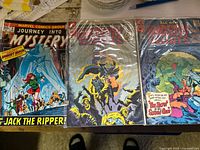 Marvel Journey Into Mystery, Warlock, and another Marvel horror comic