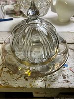 Clear fluted glass butter dish with dome and plate