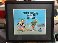 Framed serigraph overall view