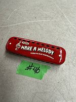 Red Make A Melody learn-to-play harmonica front view