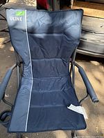 Front view of black ULINE camping chair with padded back, armrests, and gray piping detail.