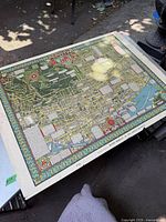 Full view of 1941 Montreal map showing streets, landmarks, and decorative border in color.