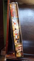 Spine of the book showing title 'MAGIC' with artistic magical imagery and credited authors.