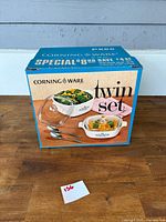 Box of Corning Ware P888 Twin Set showing front with images of saucepans and text.