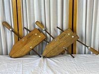 Both Jorgensen wood hand screw clamps shown side by side on white surface with curtain background