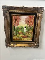 Frontal view of the Louis Cardin painting and full decorative frame