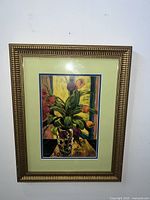 Framed MCM vintage still life painting with flowers in vase, signed and with gallery label on verso, shown from front.