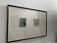 Full view of the framed etchings showing the arrangement and overall size.