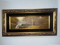 Full front image of the painting showing the nature scene and frame