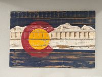 Image showing a hand painted Colorado state flag on a wooden pallet with rustic weathered finish.