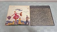 Photo of two LP records side by side showing The Sound of Music cover and English Romantic Poetry cover