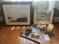 Photo showing whole lot: two framed prints, marble eggs in glass dish, potpourri bowl, battery-operated candle with wreath, door wreath hanger, and small decorative items.
