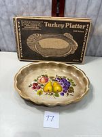Pfaltzgraff stoneware turkey platter with floral and fruit hand painted design, scalloped edges, shown with original box and measuring ruler.