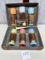 Full set of six frosted glass tiki bar glasses in several pastel colors displayed inside original box and with Beachcomber label card visible.
