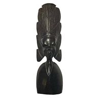 Front view showing full height and carving details of the ebony Makonde sculpture.