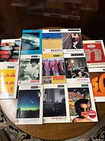 Photo showing front covers of multiple Granta literary magazines from 1995-1999 with various themes: Sea, Beasts, Ambition, India, Love Stories, Women and Children First, News, and others.