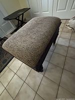 Top-angle view showing cushioned seat upholstery texture and condition.