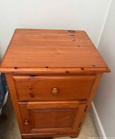 Front view showing drawer and cupboard closed