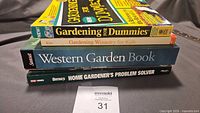 Stacked view of all five gardening books