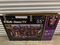 Closed retail box for RCA Roku 55" TV showing packaging graphics and feature labels