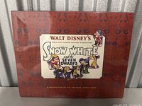 Front of sealed pack of six lobby cards with title and dwarfs artwork