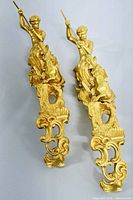 Front view of both sconces on white background