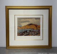 Full view of framed print 'Madawaska River' in gold frame and mat