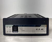 Front view showing power switch, indicator LEDs and brushed silver front panel with Precision Class A Amplifier label.