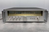 Front view of Kenwood KT-917 FM stereo tuner showing controls and meters