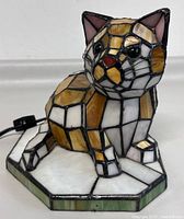 Front right angle of cat nightlight showing color and shape