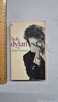 Front cover of 1969 Bob Dylan book by Daniel Kramer, showing black and white portrait of Bob Dylan.