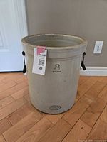 Front view of the 8 gallon Medalta Imperial stoneware crock showing handles and Imperial 8 gallon stamp