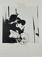 Close-up of recto showing printed image, stamps and pencil signature